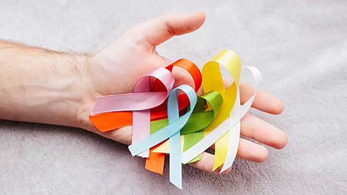 Cancer Ribbons in hand
